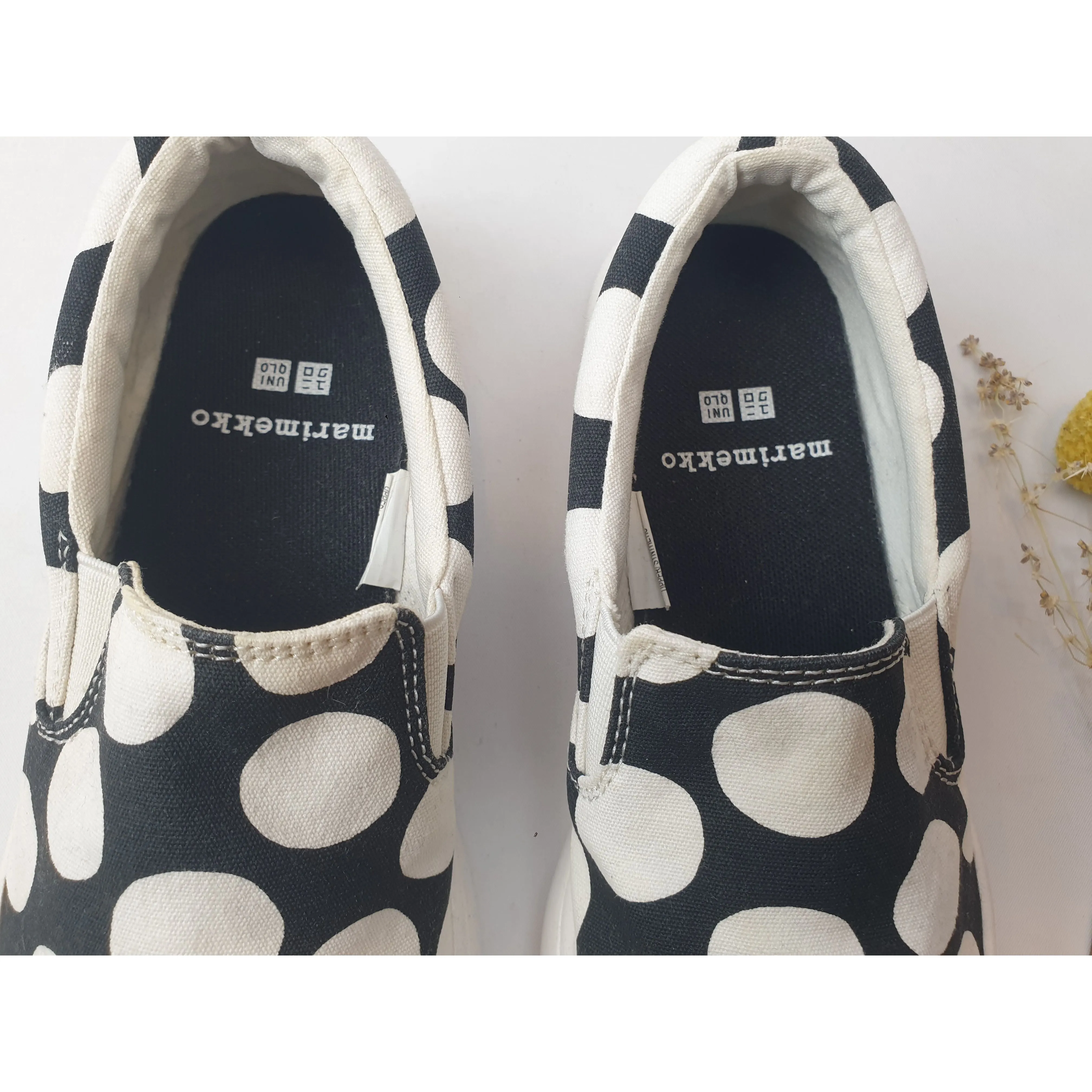 Marimekko x Uniqlo light weight black slide on shoes with large white polka dots size 6