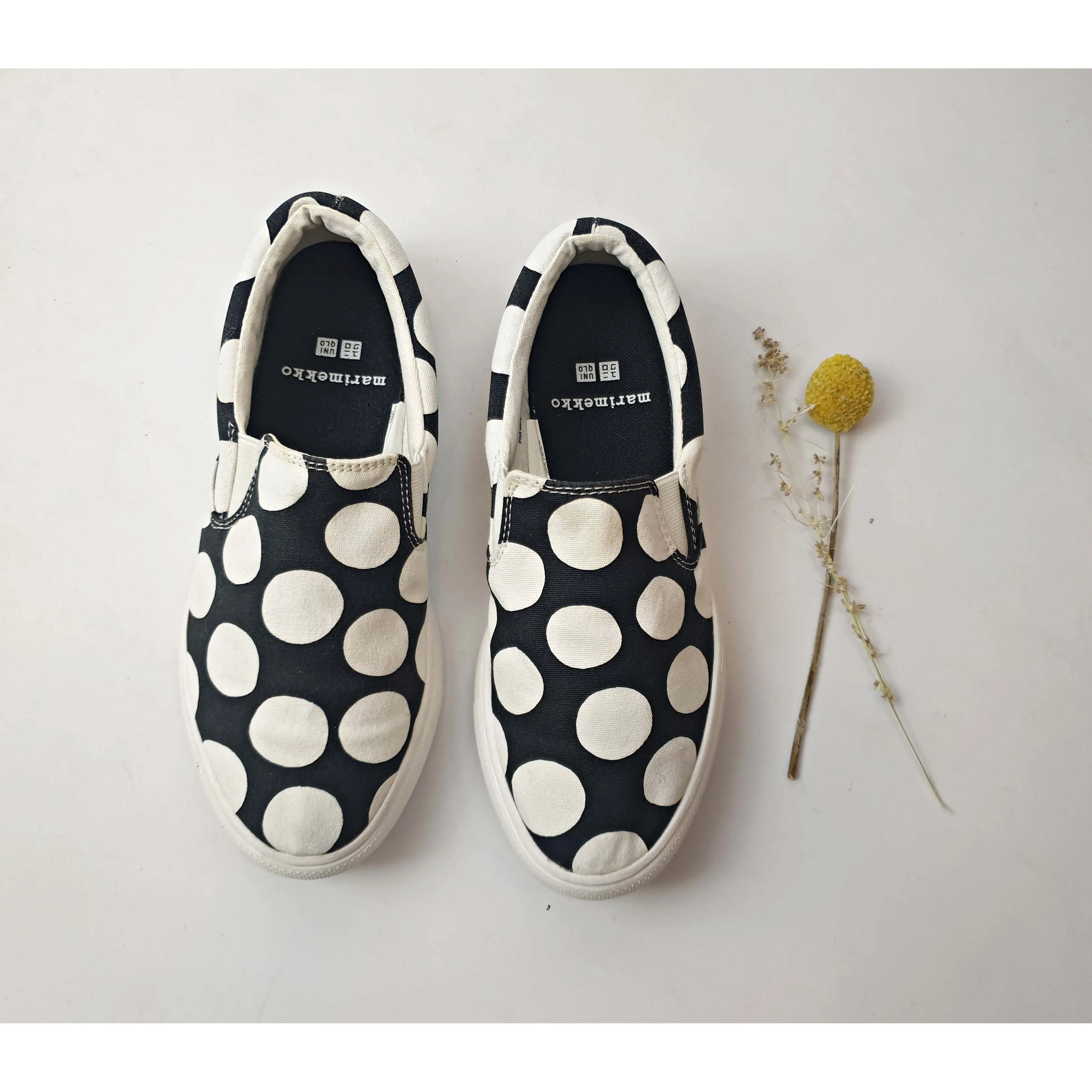 Marimekko x Uniqlo light weight black slide on shoes with large white polka dots size 6