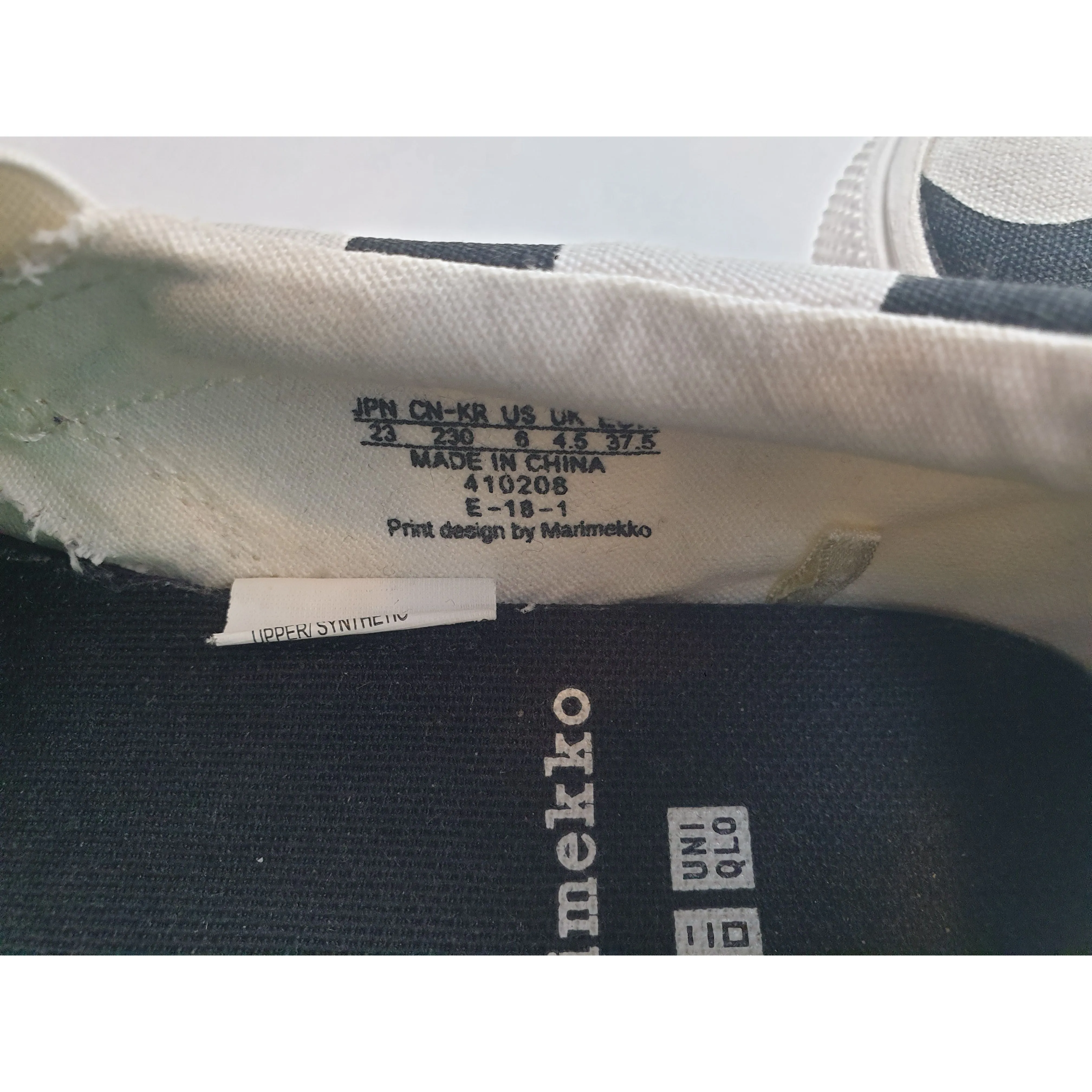 Marimekko x Uniqlo light weight black slide on shoes with large white polka dots size 6